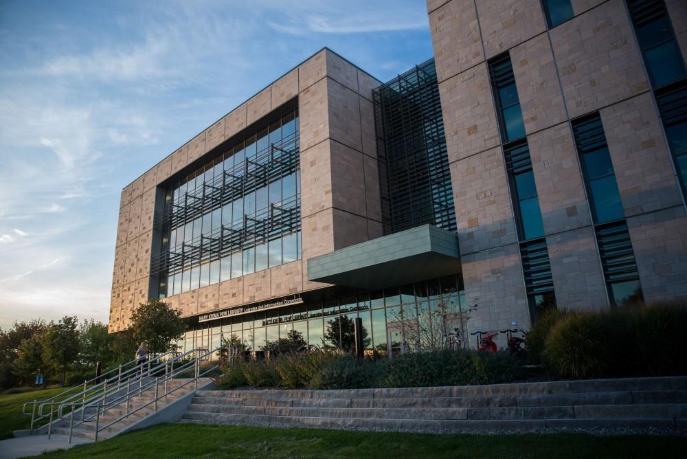 GVL / Luke Holmes - The Mary Idema Pew Library beautifully reflects the sunset. 