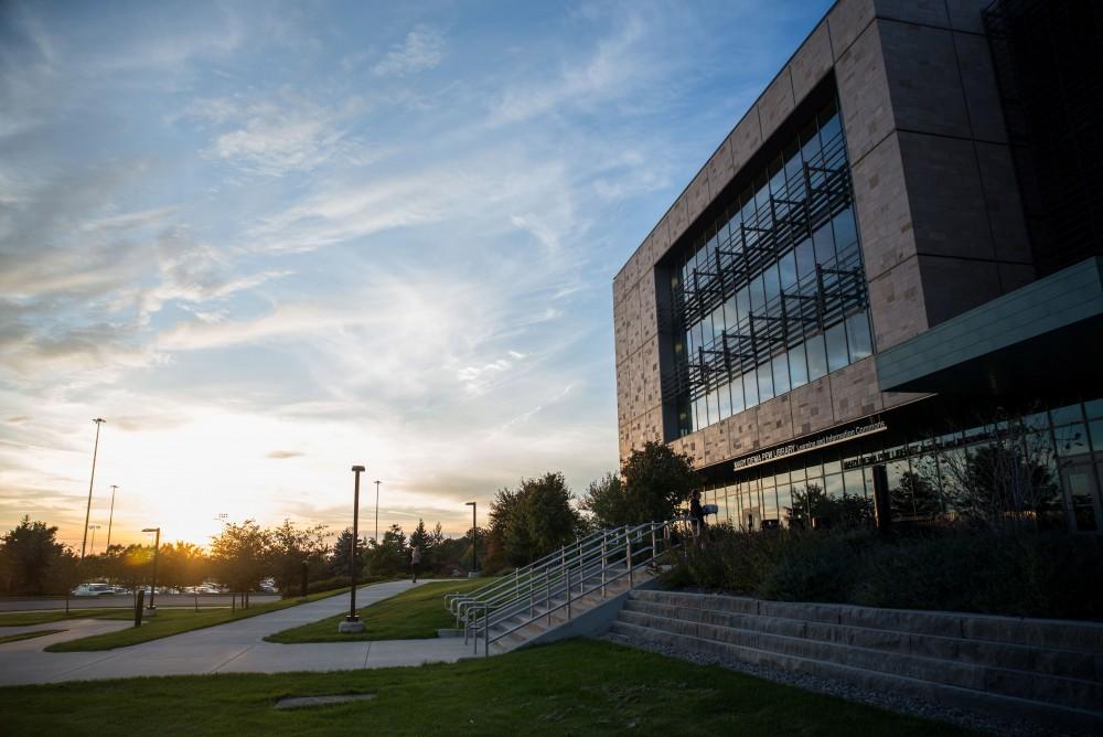 GVL / Luke Holmes - The Mary Idema Pew Library beautifully reflects the sunset.