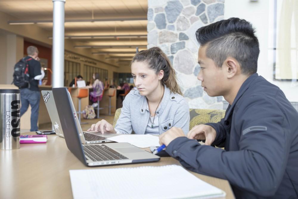 GVL / Sara Carte
Callie Spytman (left) and Lee Hewson (right) study for their exams in the Mary Idema Pew Library on Tuesday, Oct. 11, 2016.