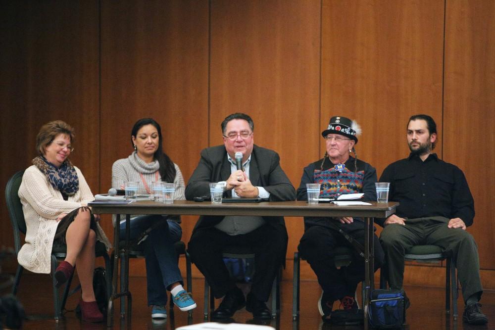 GVL / Emily Frye    
(From left to right) Patti Caudill, Belinda Bardwell, Levi Rickert, Steve Perry, and Ben Williams during the NASA "Water is Life" rally on Monday Oct. 10, 2016.