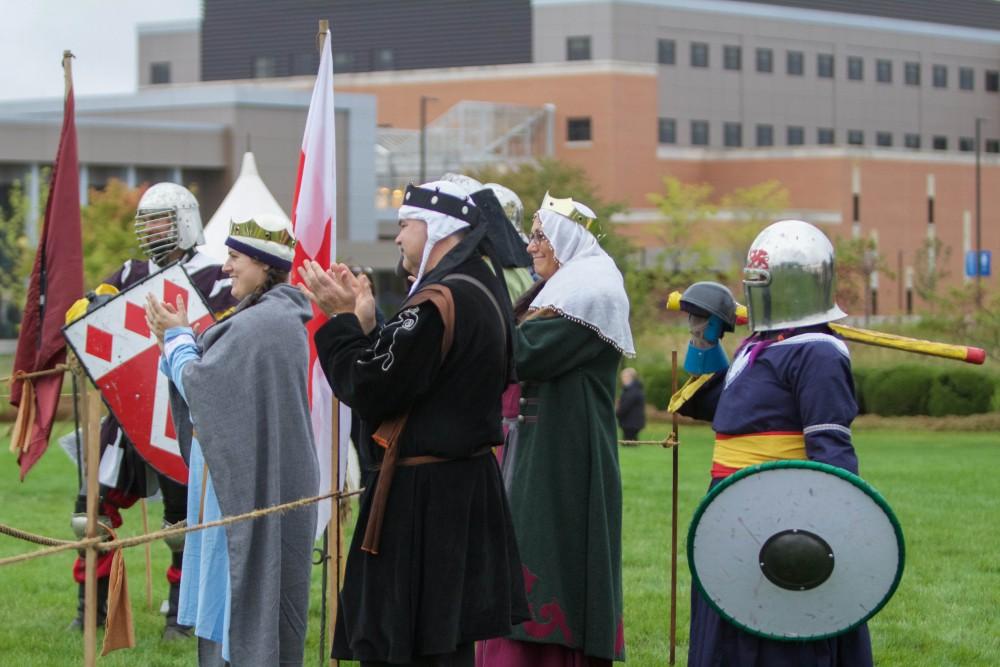 GVL/Mackenzie Bush - Crowd watches as Renaissance participants act out a battle on Saturday, Oct. 1, 2016 at the Renaissance Festval outside of Kirkof.