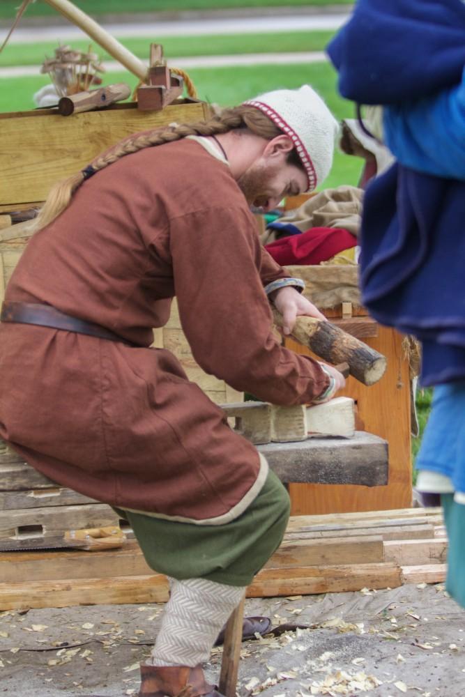 GVL/Mackenzie Bush - Vince Giacalone works on building a bed from homemade tools used in the 1500s at the Renaissance Festival outside Kirkof on Saturday, Oct. 1, 2016.