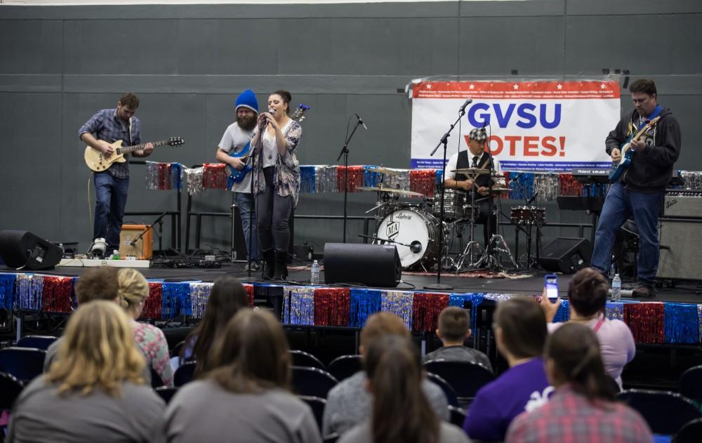 GVL/Kevin Sielaff - Love Handle, a Grand Rapids area blues and jazz band, performs on stage during Rock the Vote. Student Senate hosts Rock the Vote as part of Student Civic Assembly week Friday, Sept. 30, 2016 inside the Fieldhouse Arena. 