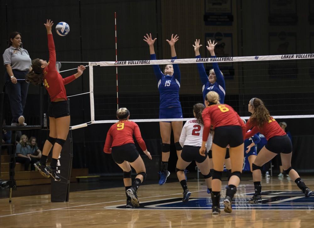 GVL/Kevin Sielaff - Jayci Suseland (15) leaps up to try to make a block. The Lakers fall to the Bulldogs of Ferris State with a final score of 1-3 Tuesday, Sept. 27, 2016 in Allendale.