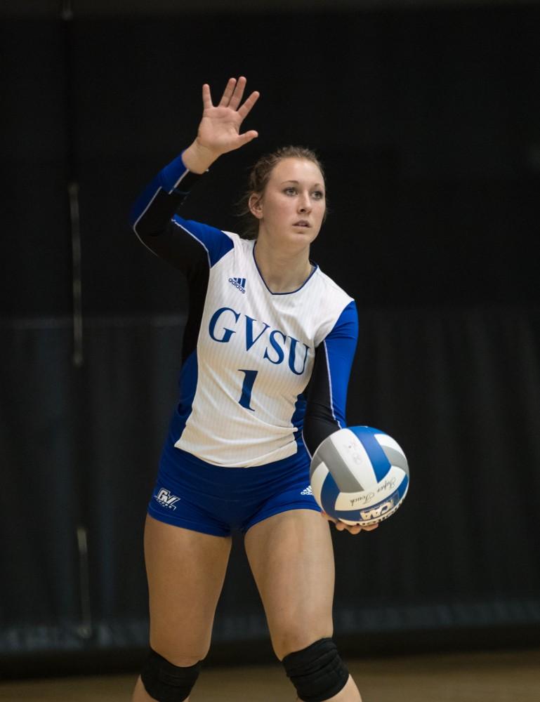 GVL/Kevin Sielaff - Sydney Benchley (1) serves the ball. The Lakers sweep the Cavaliers of Walsh University Saturday, Sept. 24, 2016 in Allendale.