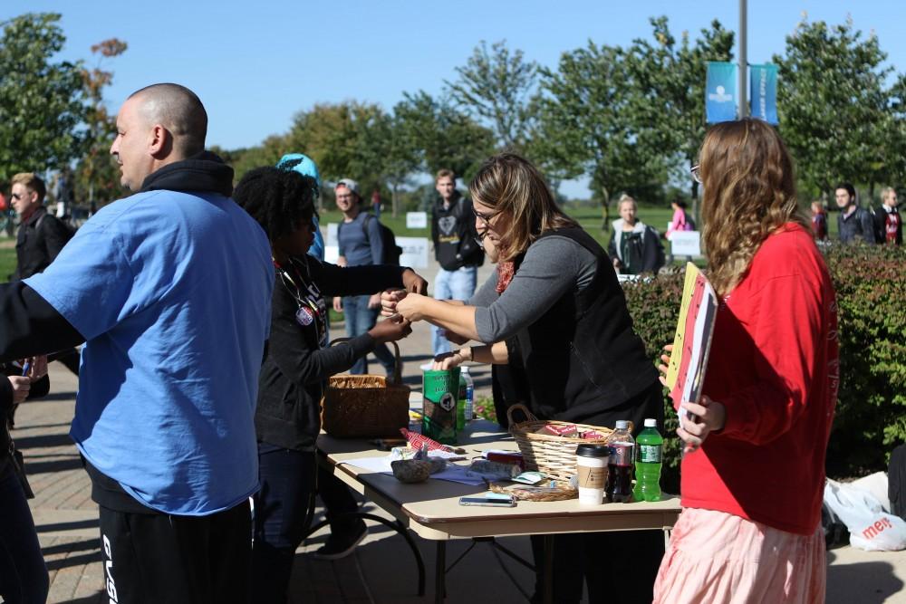 GVL / Luke Holmes - The "Water is Life" awareness rally was held right next to the clock tower on Monday, Oct. 10, 2016.