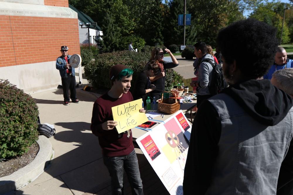 GVL / Luke Holmes - The "Water is Life" awareness rally was held right next to the clock tower on Monday, Oct. 10, 2016.