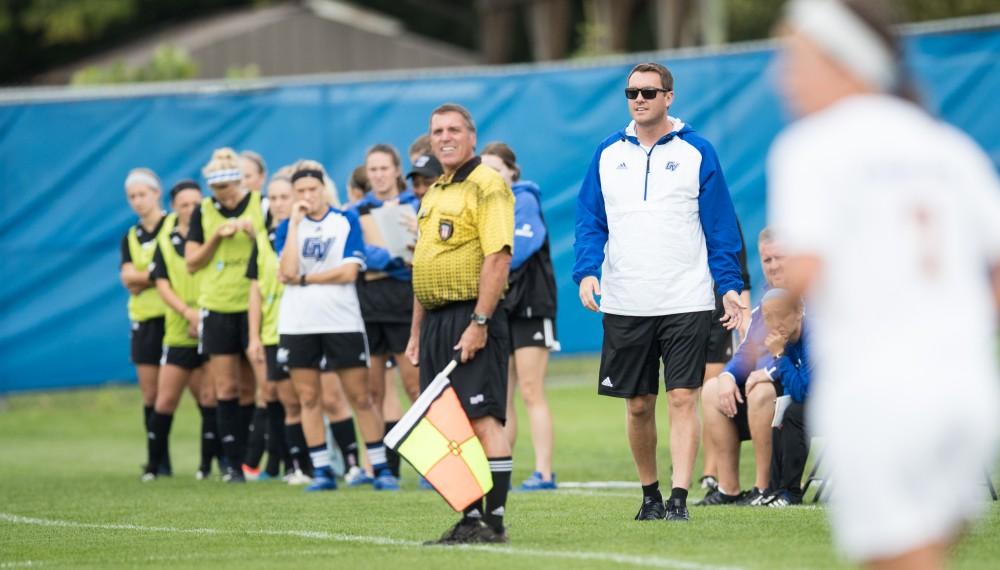 GVL/Kevin Sielaff - Head coach Jeff Hosler calls to his team from the sideline. The Lakers square off against the Eagles of Ashland University Sunday, Oct. 2, 2016 and win with a final score of 5-0 in Allendale.