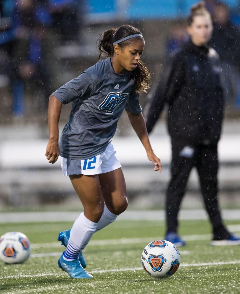 GVL/Kevin Sielaff - Jayma Martin (12) warms up before the match. The Lakers square off against the Dragons of Tiffin University Friday, Sept. 30, 2016 and win with a final score of 10-0 at Lubbers Stadium.