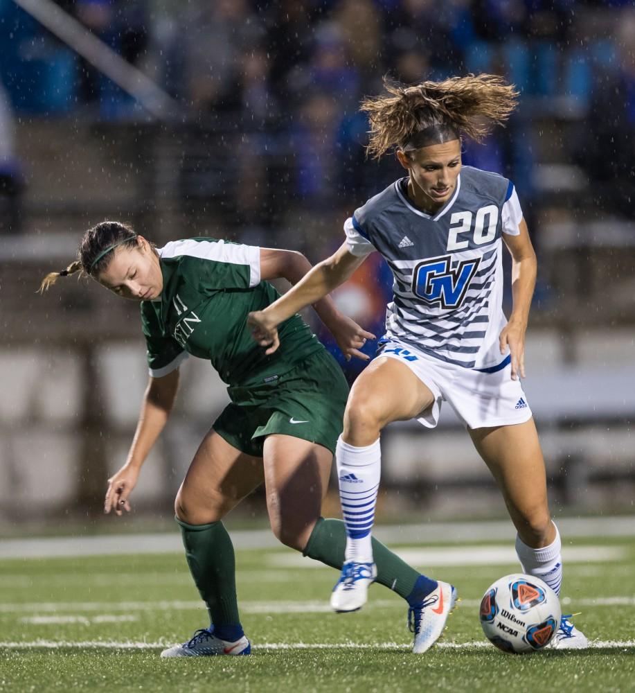 GVL/Kevin Sielaff - Gabriella Mencotti (20) fights for the ball in Tiffin's zone. The Lakers square off against the Dragons of Tiffin University Friday, Sept. 30, 2016 and win with a final score of 10-0 at Lubbers Stadium.