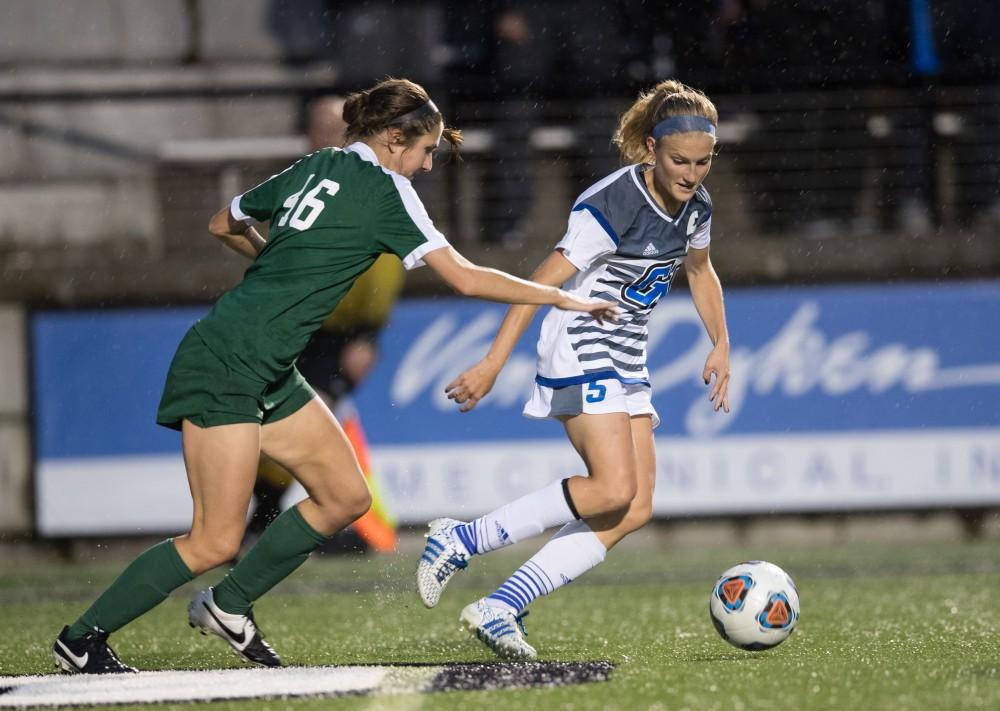 GVL/Kevin Sielaff - Kendra Stauffer (5) sweeps her way through Tiffin's defense. The Lakers square off against the Dragons of Tiffin University Friday, Sept. 30, 2016 and win with a final score of 10-0 at Lubbers Stadium.