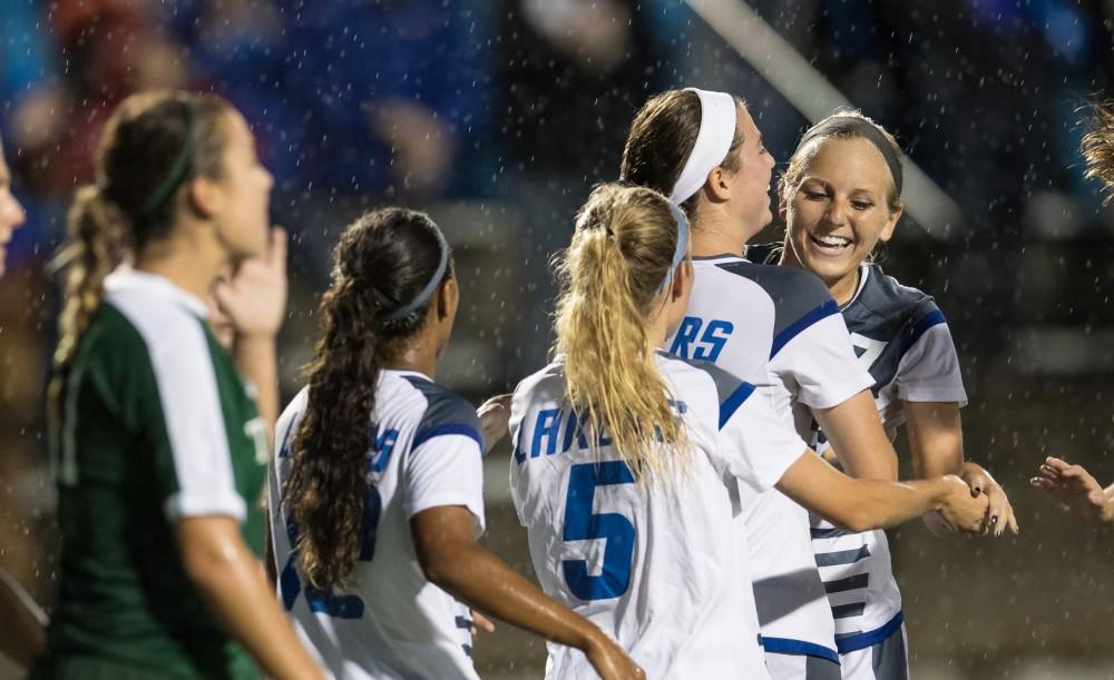 GVL/Kevin Sielaff - Erika Bradfield (17) and company celebrate a Laker goal. The Lakers square off against the Dragons of Tiffin University Friday, Sept. 30, 2016 and win with a final score of 10-0 at Lubbers Stadium.