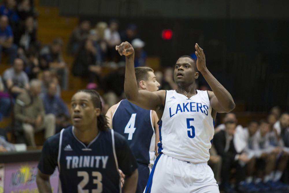 GVL / Luke Holmes - Trevin Alexander (5) follows through after taking the shot. GVSU defeated Trinity Christian on Friday, Nov. 18, 2016. 