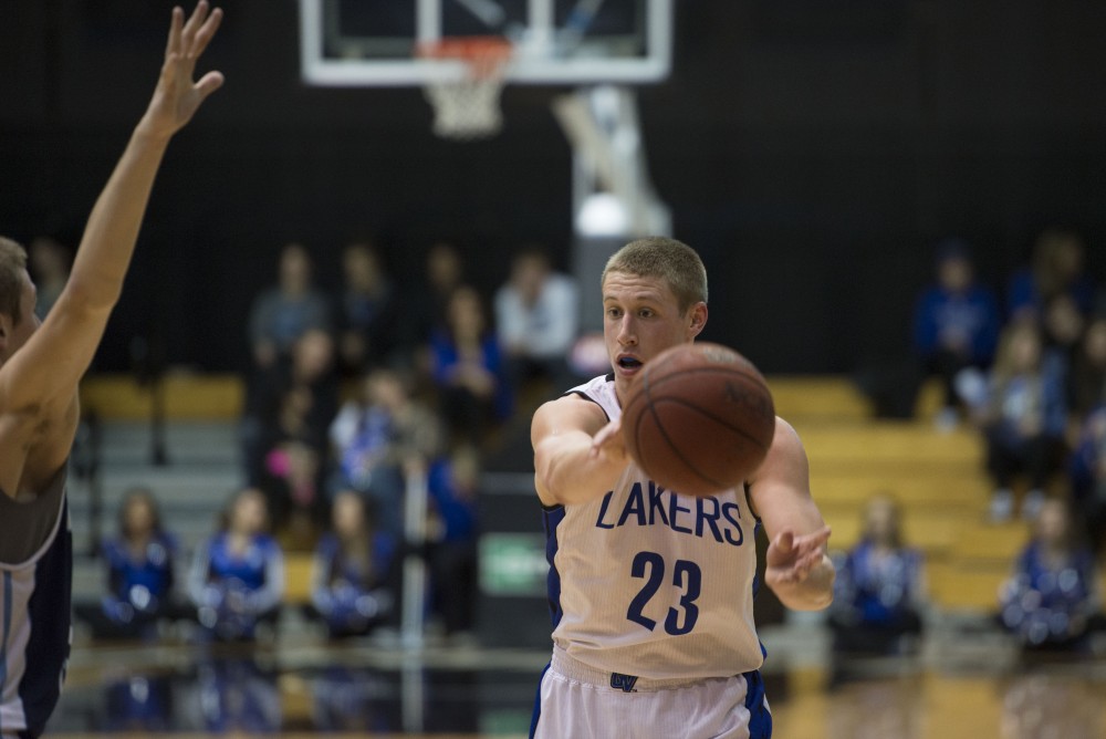 GVL / Luke Holmes - Luke Ryskamp (23) makes a pass. GVSU defeated Trinity Christian on Friday, Nov. 18, 2016. 