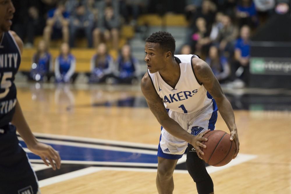 GVL / Luke Holmes - Danzel Wright (1) sets up on the arc. GVSU defeated Trinity Christian on Friday, Nov. 18, 2016. 