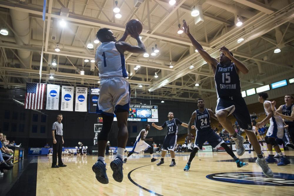 GVL / Luke Holmes - Danzel Wright takes a shot from outside. GVSU defeated Trinity Christian on Friday, Nov. 18, 2016. 