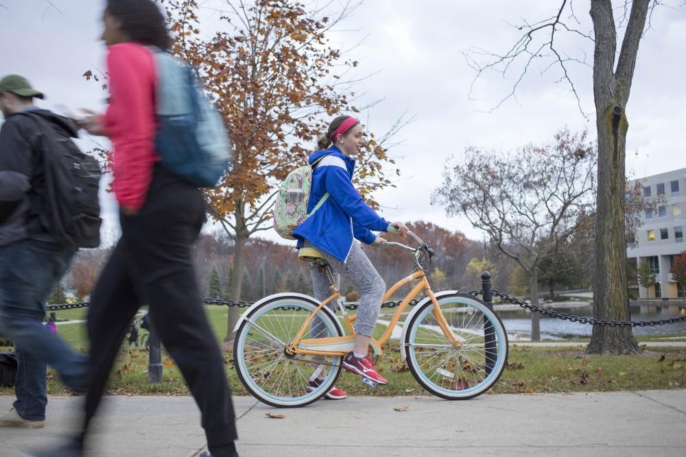 GVL / Sara Carte
Alison Farnsworth rides her bike near Kirkhof Center on Tuesday, Nov. 8, 2016.