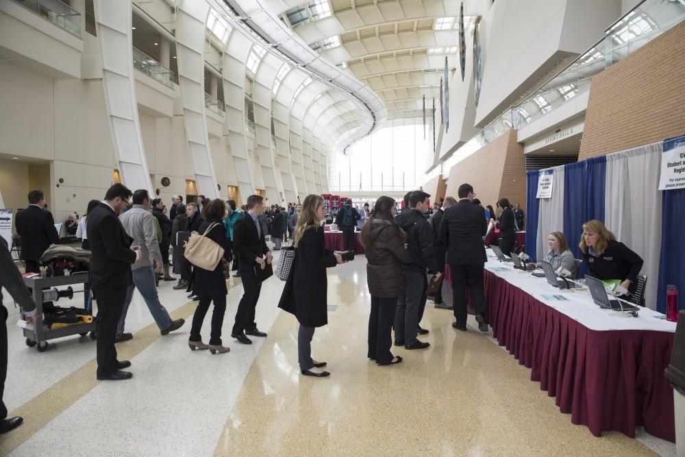 GVL / Luke Holmes - Students line up for registration. The career fair was held in the Devos Place Thursday, Feb. 26, 2016.