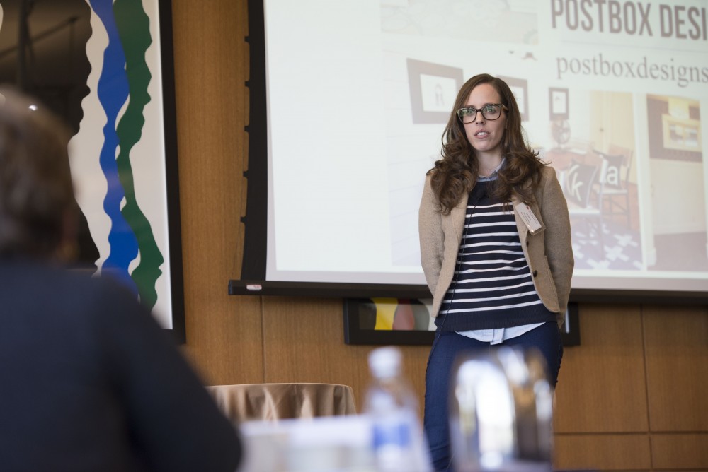 GVL / Luke Holmes - Kristin Thompson pitches her business plan in front of the investors. The final pitch of the Dolphin Tank Competition was held Thursday, Nov. 10, 2016 in the Seidman College of Business.