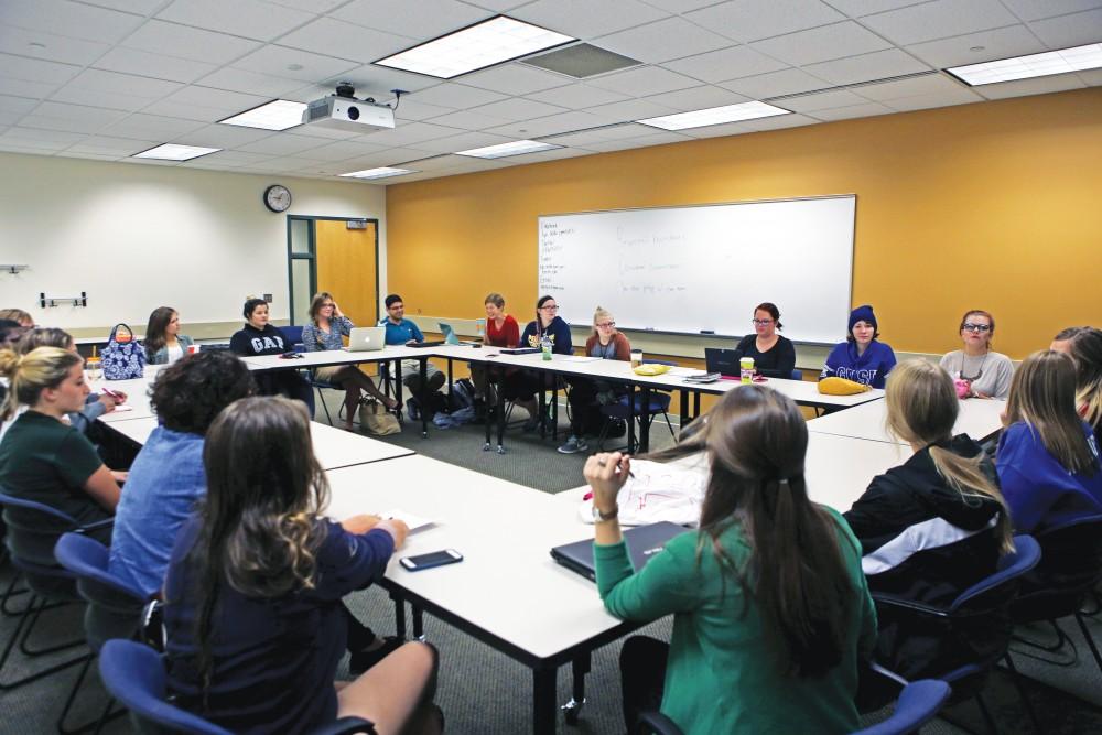 GVL/Emily Frye - The Grand Valley State University group "Eyes Wide Open" discusses current global events relating to sexual assult on Monday, Sept. 21, 2015.