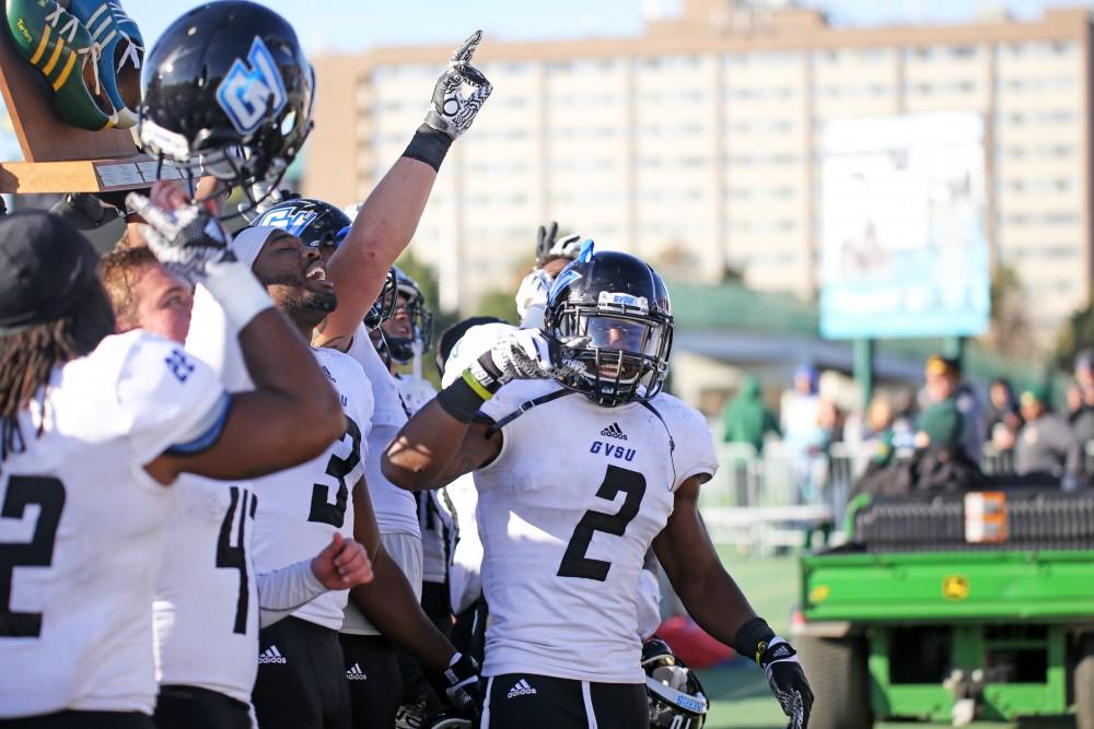 GVL / Emily Frye 
Grand Valley State football sings to the crowd after the game against Wayne State University on Saturday Nov. 12, 2016