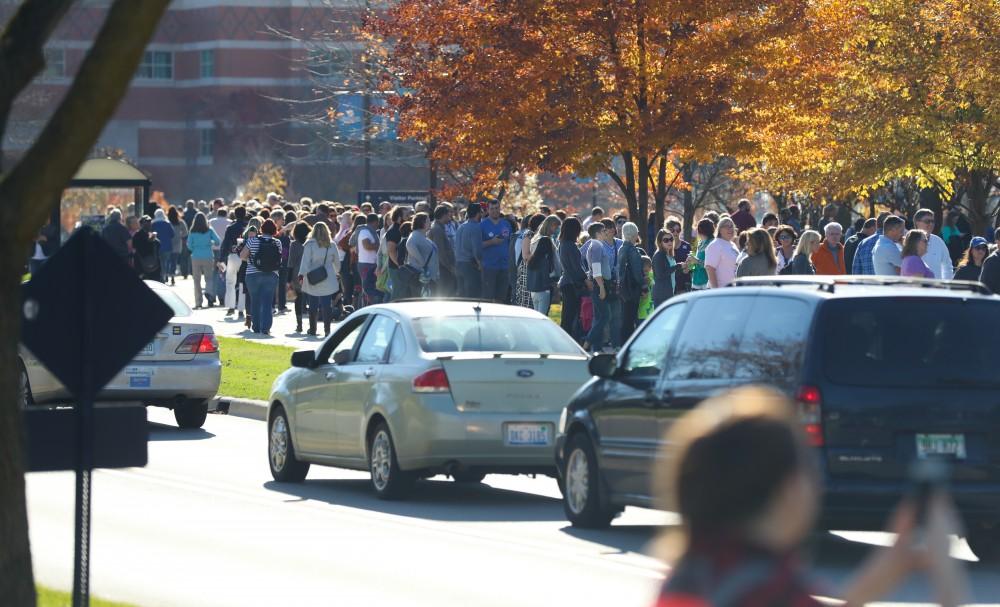 GVL/Kevin Sielaff - Spectators line up before Hillary Clinton's speech at Grand Valley State's Fieldhouse Arena on Monday, Nov. 7, 2016. 