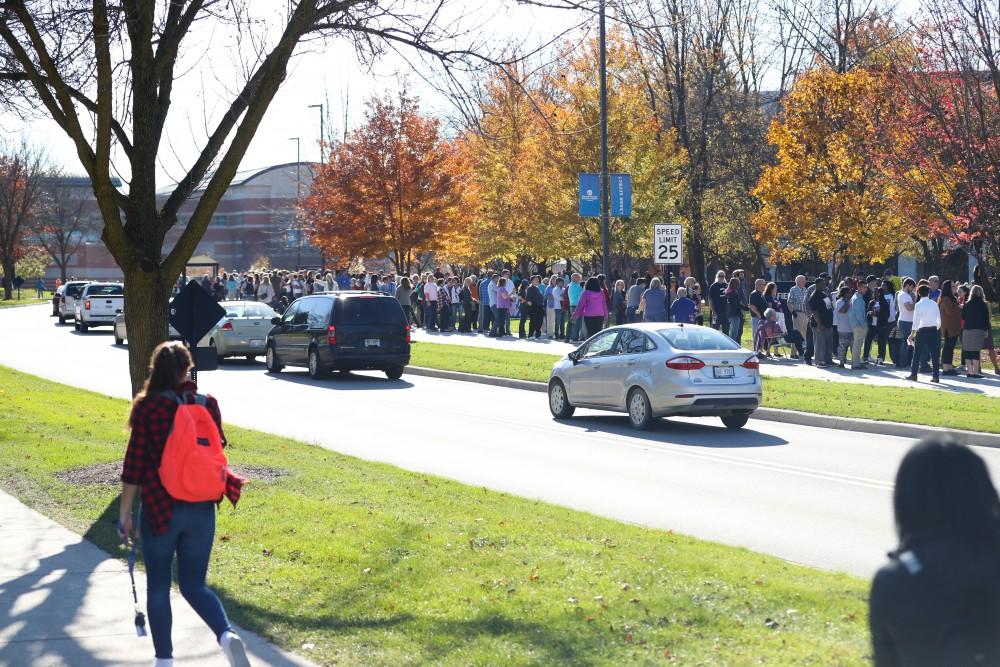 GVL/Kevin Sielaff - Spectators line up before Hillary Clinton's speech at Grand Valley State's Fieldhouse Arena on Monday, Nov. 7, 2016. 