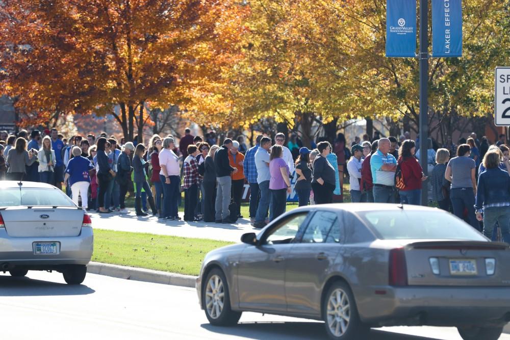 GVL/Kevin Sielaff - Spectators line up before Hillary Clinton's speech at Grand Valley State's Fieldhouse Arena on Monday, Nov. 7, 2016. 