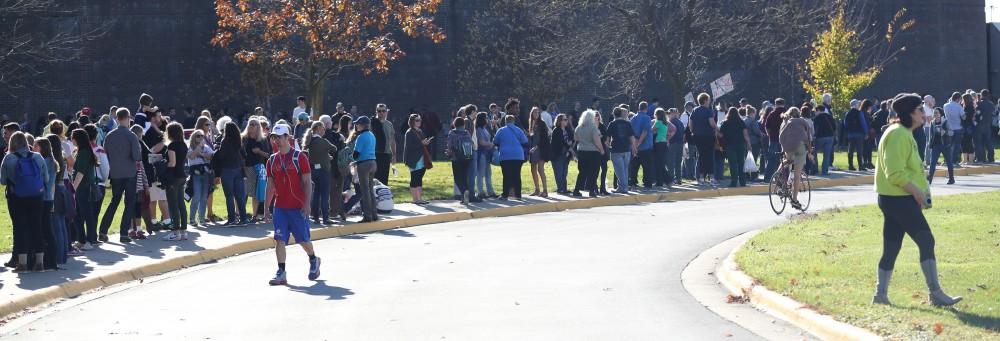 GVL/Kevin Sielaff - Spectators line up before Hillary Clinton's speech at Grand Valley State's Fieldhouse Arena on Monday, Nov. 7, 2016. 