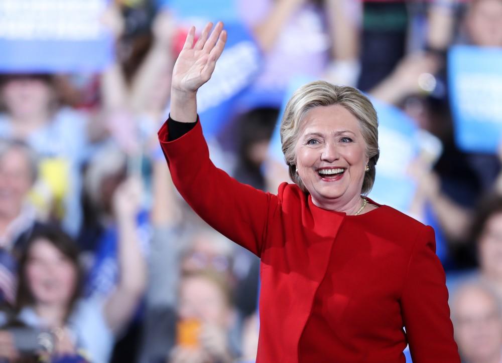 GVL/Kevin Sielaff - Hillary Clinton takes the stage at Grand Valley State's Fieldhouse Arena on Monday, Nov. 7, 2016. 