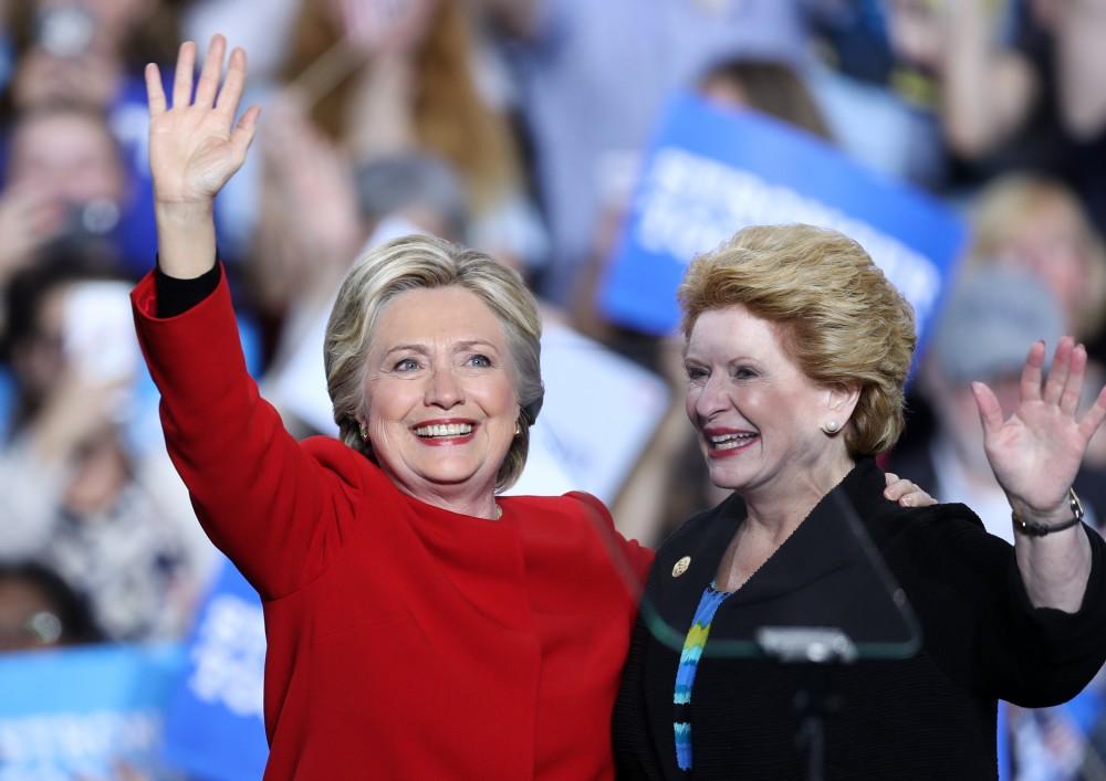 GVL/Kevin Sielaff - Hillary Clinton takes the stage with Senator Debbie Stabenow at Grand Valley State's Fieldhouse Arena on Monday, Nov. 7, 2016. 