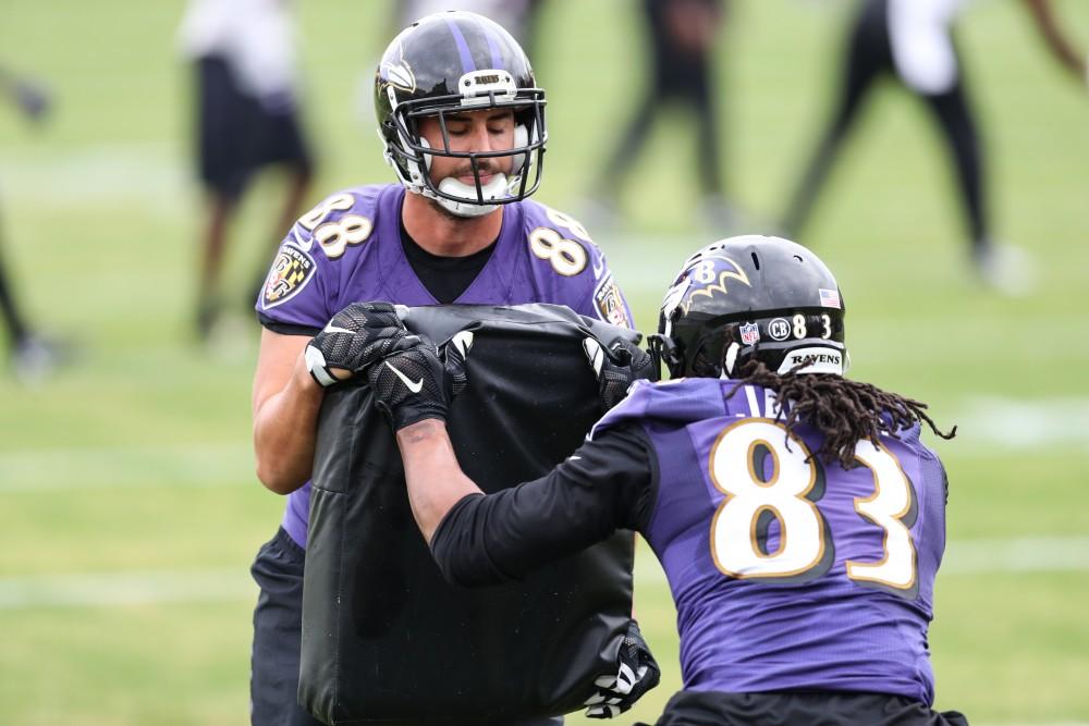 GVL/Kevin Sielaff - Dennis Pitta (88) runs a drill with Nic Jacobs (83) during a Baltimore Ravens practice on Thursday, Nov. 3, 2016 in Baltimore, Maryland. 