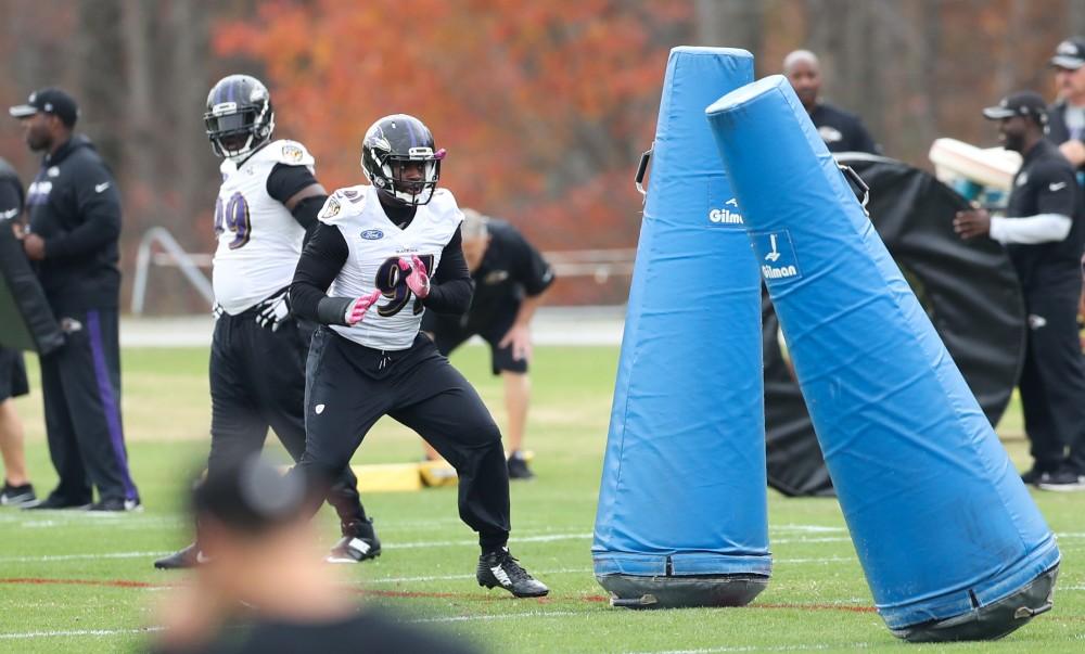 GVL/Kevin Sielaff - Matt Judon (91) runs through weighted dummies during a Baltimore Ravens practice on Thursday, Nov. 3, 2016 in Baltimore, Maryland. 