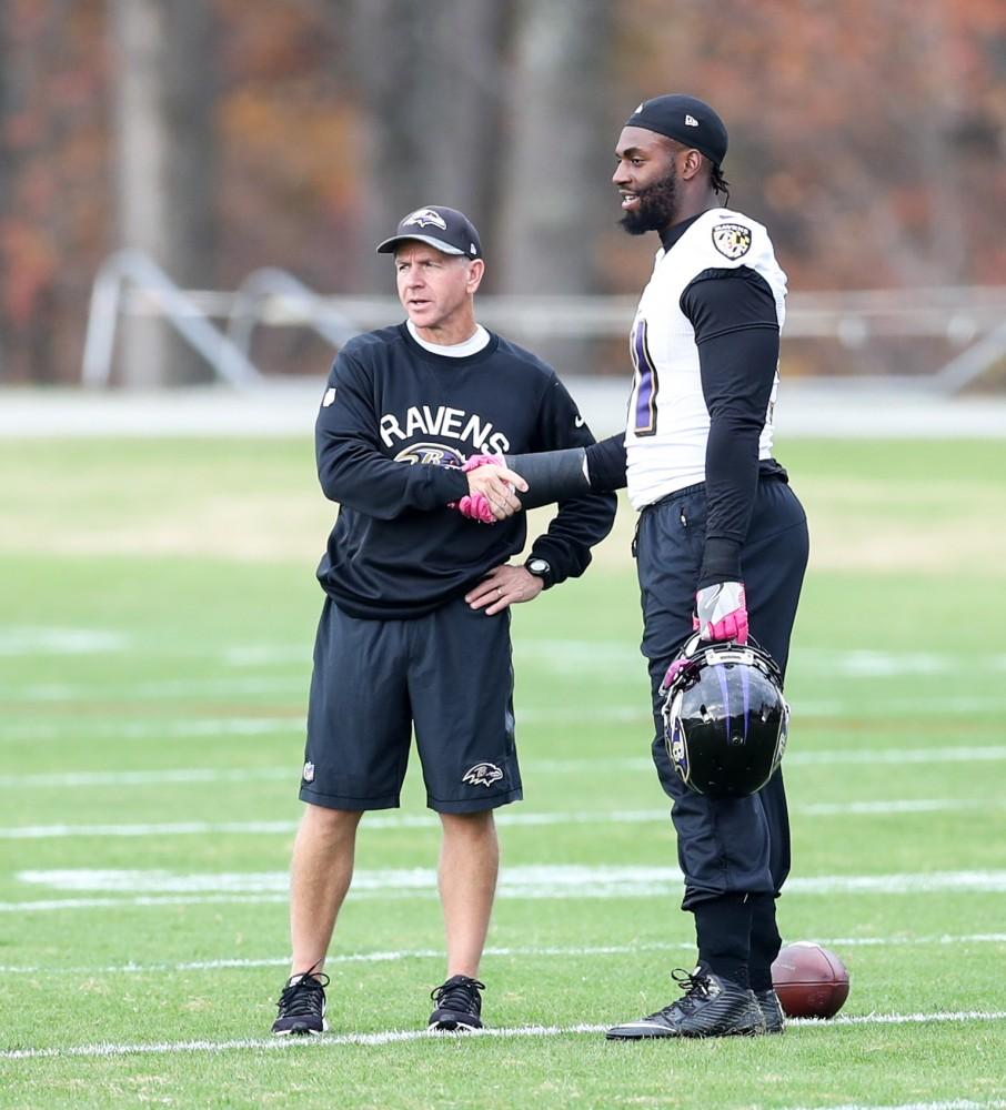 GVL/Kevin Sielaff - Matt Judon (91) greets coaching staff upon arrival at the practice field of the Baltimore Ravens' training facility on Thursday, Nov. 3, 2016 in Baltimore, Maryland. 