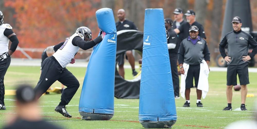 GVL/Kevin Sielaff - Matt Judon (91) runs through weighted dummies during a Baltimore Ravens practice on Thursday, Nov. 3, 2016 in Baltimore, Maryland. 