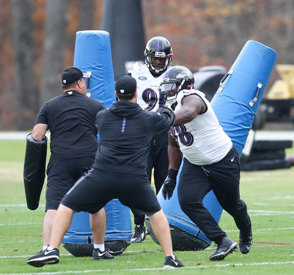 GVL/Kevin Sielaff - Matt Judon (91) awaits his turn to run through weighted dummies during a Baltimore Ravens practice on Thursday, Nov. 3, 2016 in Baltimore, Maryland.