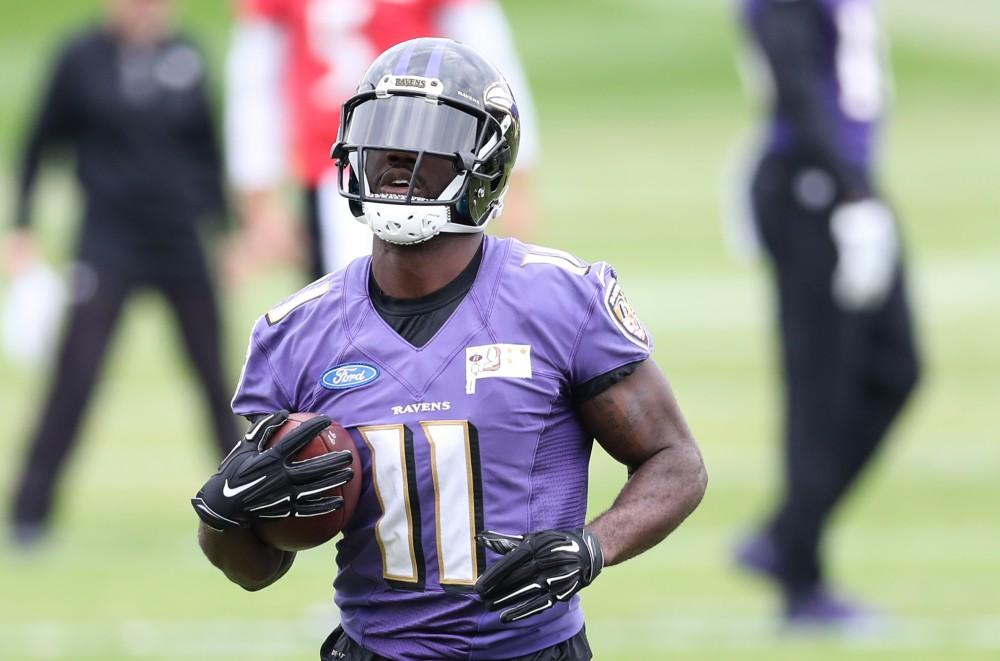 GVL/Kevin Sielaff - Kamar Aiken (11) runs a football carry drill during a Baltimore Ravens practice on Thursday, Nov. 3, 2016 in Baltimore, Maryland. 