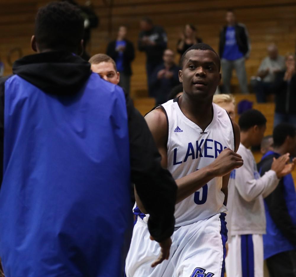 GVL/Kevin Sielaff - Trevin Alexander (5) hypes the team up before the game versus Great Lakes Christian on Wednesday, Nov. 16, 2016.