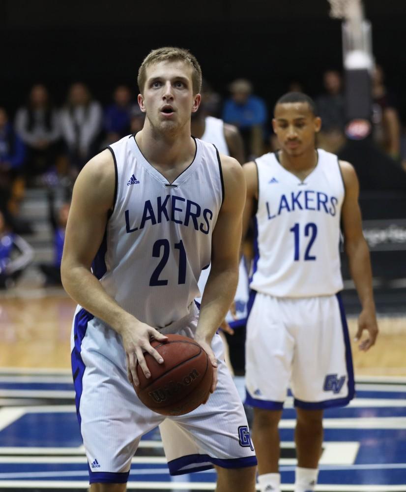 GVL/Kevin Sielaff - Drake Baar (21) steps up for a free throw during the game versus Great Lakes Christian on Wednesday, Nov. 16, 2016.