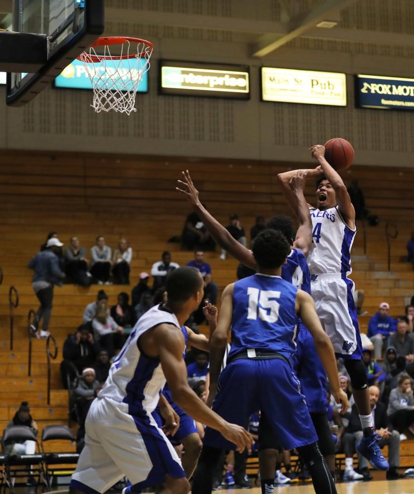 GVL/Kevin Sielaff - Justin Greason (24) steps up for a jump shot during the game versus Great Lakes Christian on Wednesday, Nov. 16, 2016.