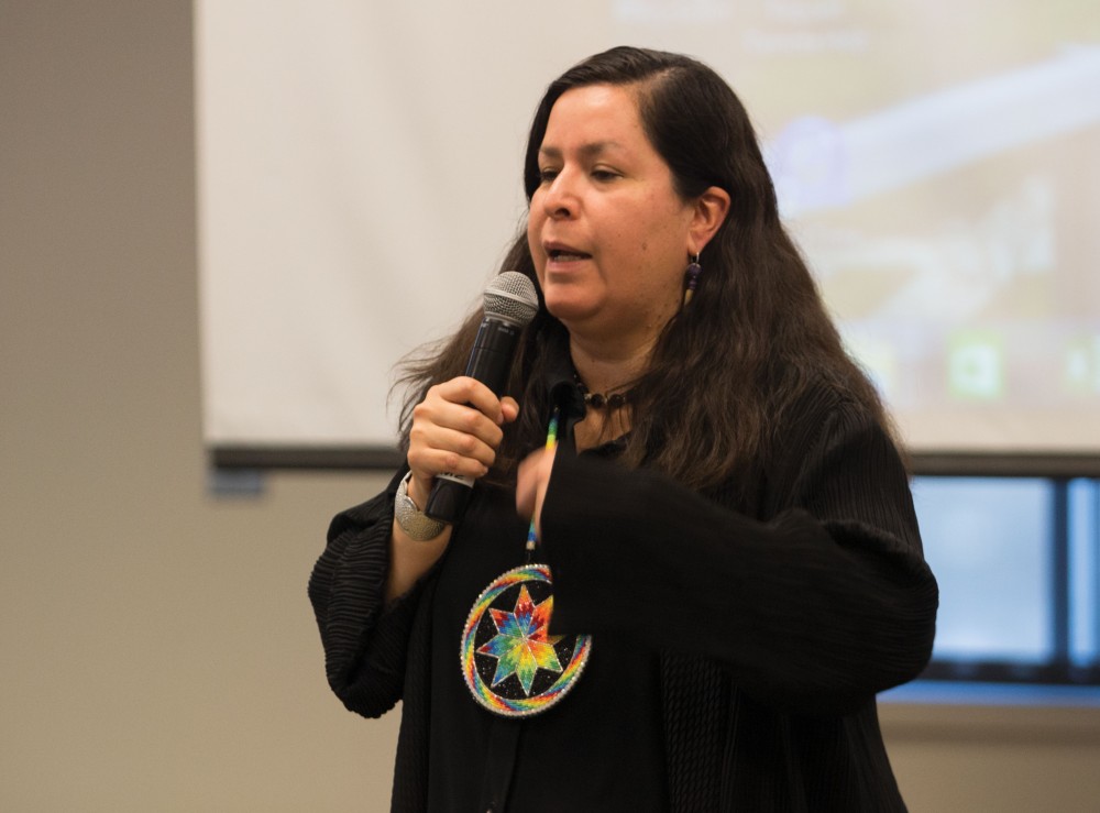 GVL/Mackenzie Bush - Shannon Martin, Director of the Ziibiwing Center, speaks anout the importance of Native American graves in Pere Marquette, Tuesday, Nov. 1, 2016.