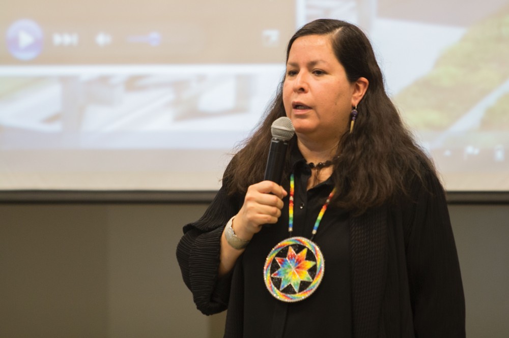 GVL/Mackenzie Bush - Shannon Martin, Director of the Ziibiwing Center, speaks anout the importance of Native American graves in Pere Marquette, Tuesday, Nov. 1, 2016.