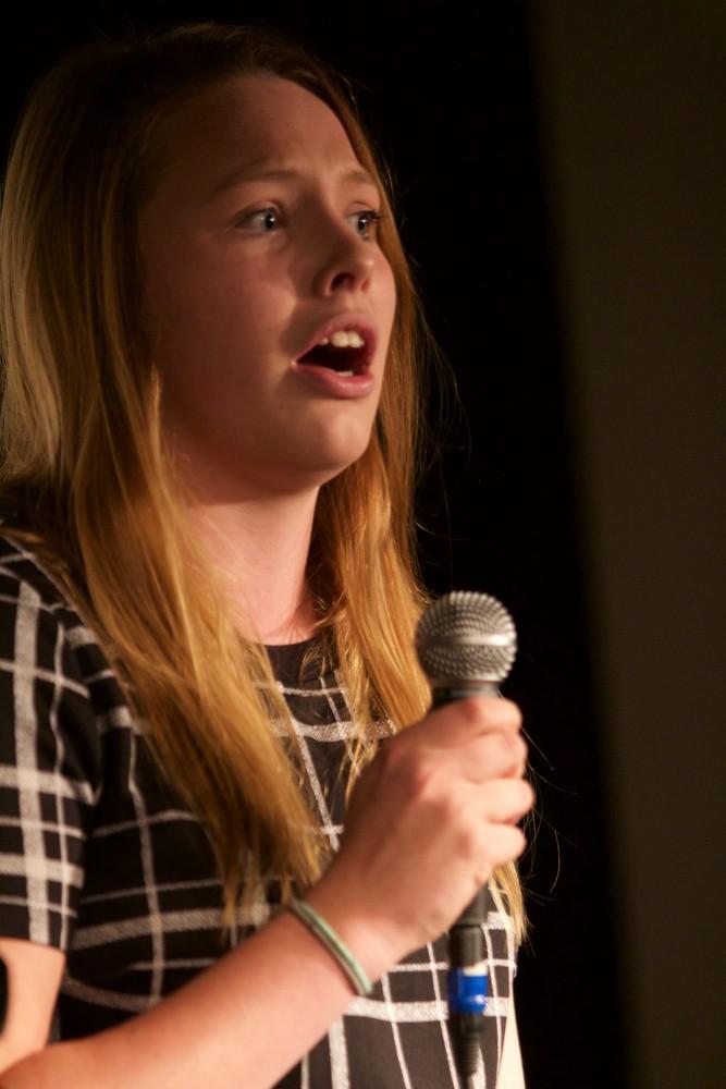 GVL/Mackenzie Bush - Allison Donahue performs at Oppression Out Loud Poetry Slam, presented by Eyes Wide Open, Thursday, Nov. 10, 2016 in Area 51. 