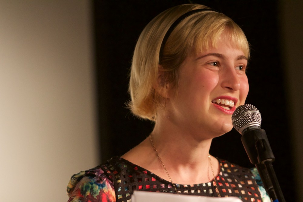 GVL/Mackenzie Bush - Annie Livingston performs at Oppression Out Loud Poetry Slam, presented by Eyes Wide Open, Thursday, Nov. 10, 2016 in Area 51. 