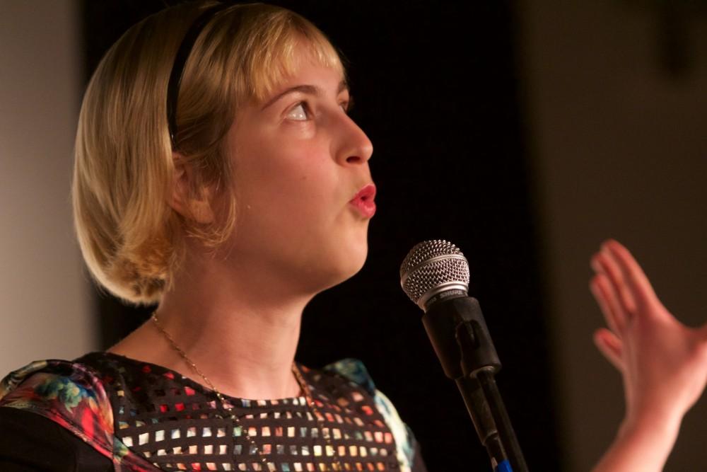 GVL/Mackenzie Bush - Annie Livingston performs at Oppression Out Loud Poetry Slam, presented by Eyes Wide Open, Thursday, Nov. 10, 2016 in Area 51. 