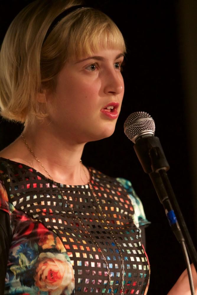 GVL/Mackenzie Bush - Annie Livingston performs at Oppression Out Loud Poetry Slam, presented by Eyes Wide Open, Thursday, Nov. 10, 2016 in Area 51. 