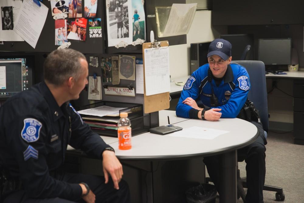 GVL / Luke Holmes - The team debriefs in the office before the night shift begins. The ride along with Sergeant Jeff Stoll took place on Saturday, Oct. 29, 2016.