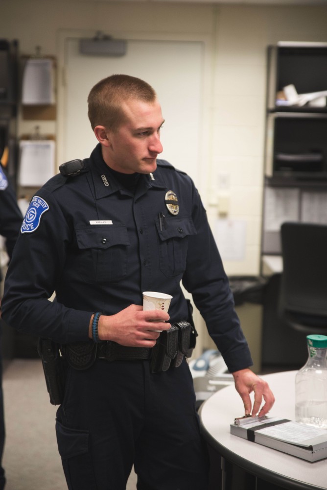 GVL / Luke Holmes - Officer Beelen gets set for his patrol in the office. The ride along with Sergeant Jeff Stoll took place on Saturday, Oct. 29, 2016.