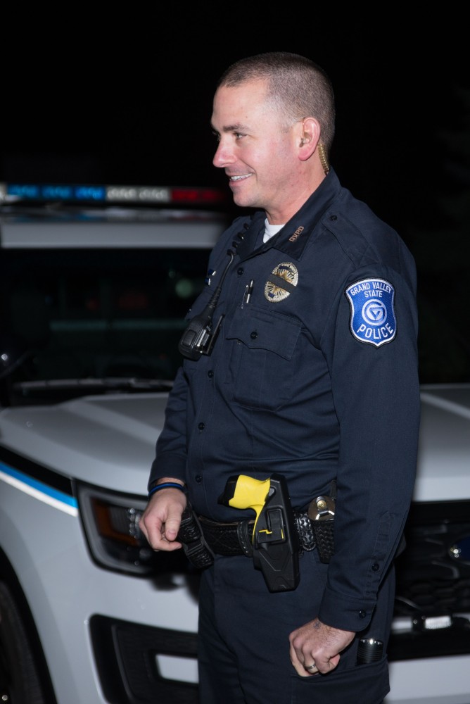 GVL / Luke Holmes - Officer Barnes gets ready for his night patrol. The ride along with Sergeant Jeff Stoll took place on Saturday, Oct. 29, 2016.