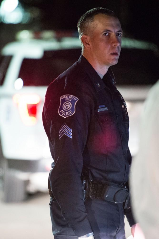 GVL / Luke Holmes - Sergeant Stoll returns to his car. The ride along with Sergeant Jeff Stoll took place on Saturday, Oct. 29, 2016.